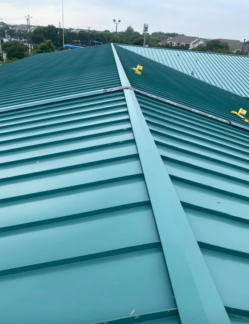 Green commercial metal roof ridge and valley for Metal Roof Repair in Seattle